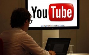 A visitor is seen at a YouTube stand